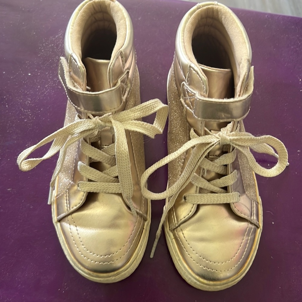 Kids size 1. perfect condition. color is almost like a rose gold with sparkles.